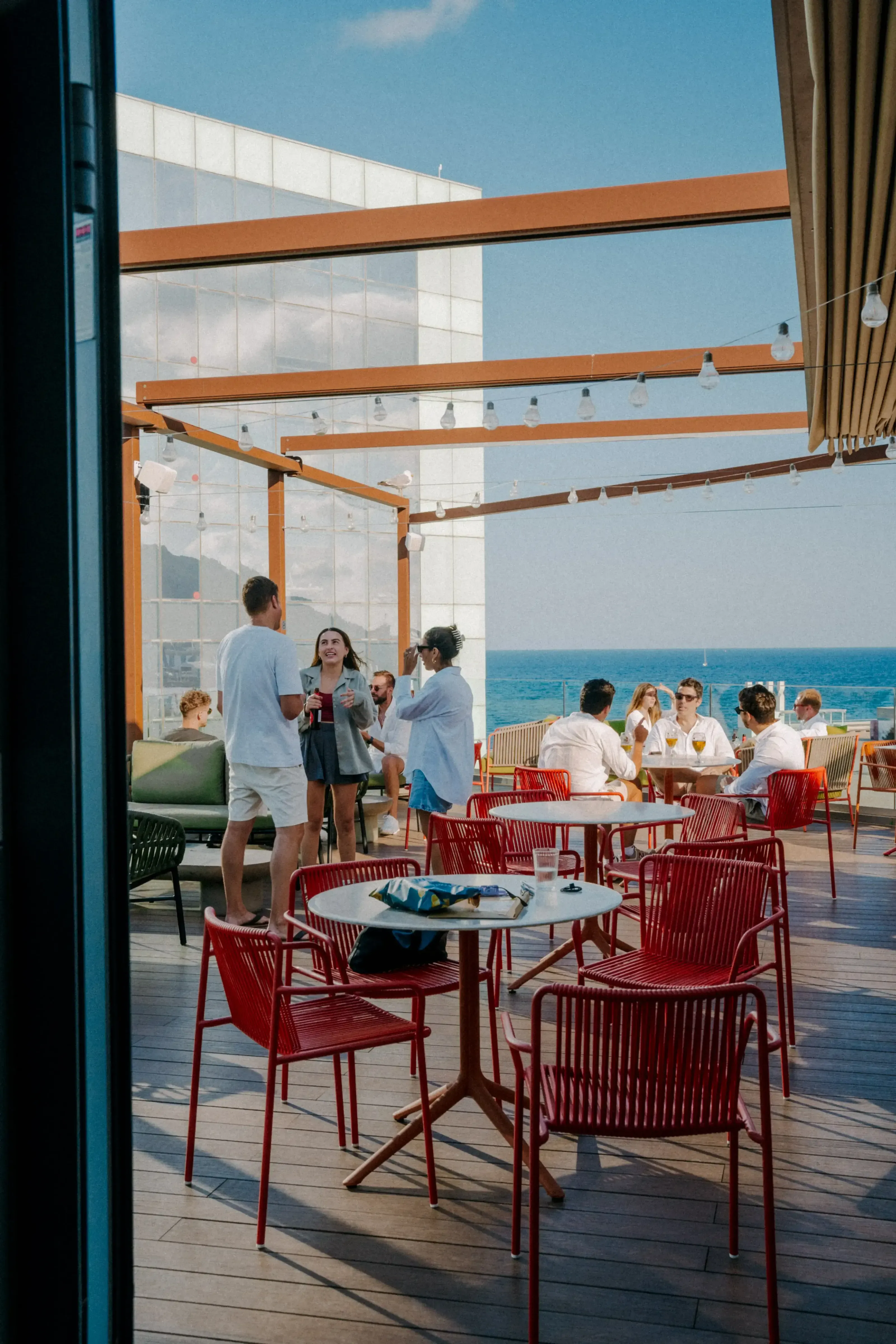 Friends on the Norrsken rooftop terrace